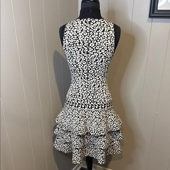 B6 MICHAEL Michael Kors Women’s XS Monochrome Patterned Midi Peplum Dress - Picture 4 of 7